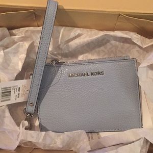 Brand new Michael Kors Clutch